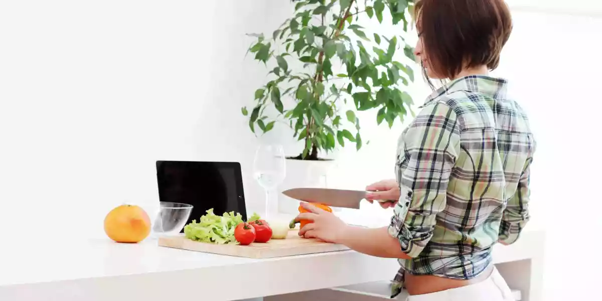 Woman preparing ingredients for a healthy vegetable dish