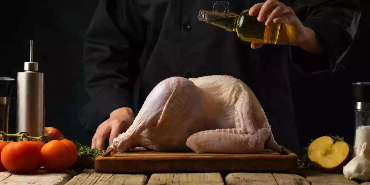 Cooking a christmas turkey with olive oil