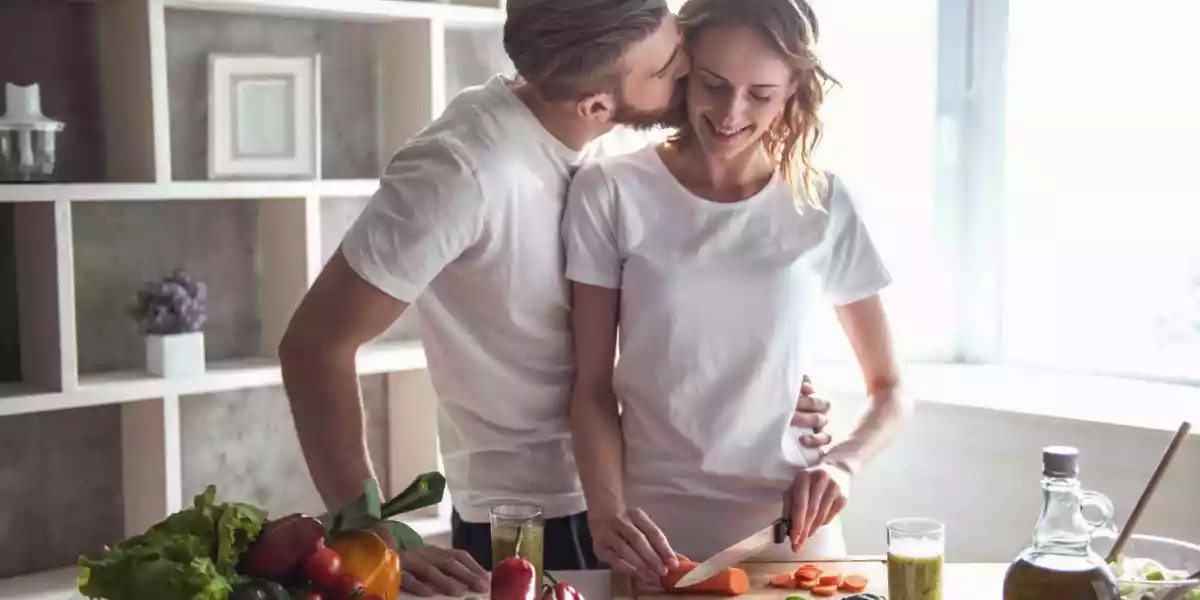 Couple cooking dinner together for valentines day
